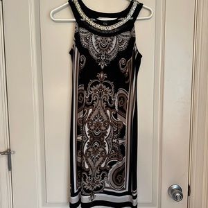 Pretty black & beige sleeveless dress with decorative neckline